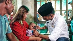 Pj Bupati Bolmong Temui dan Periksa Langsung Kondisi Kesehatan Bocah Viral di Desa Dominsil