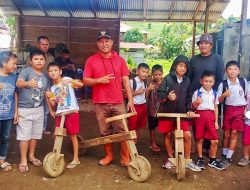 Cegah Anak Kecanduan Gadget, Bahan Sisa Pembuatan Rumah Panggung di Desa Mokobang Disulap Jadi Permainan Tradisional Sepeda Kayu