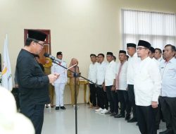 Wagub Kandow Resmi Lantik Sirajudin Lasane Jabat Ketua KONI Bolmut