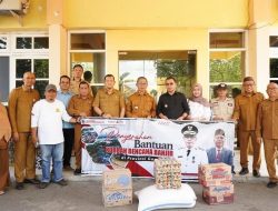 Pemkab Bolmut Serahkan Bantuan Kemanusiaan Bagi Korban Banjir di Gorontalo